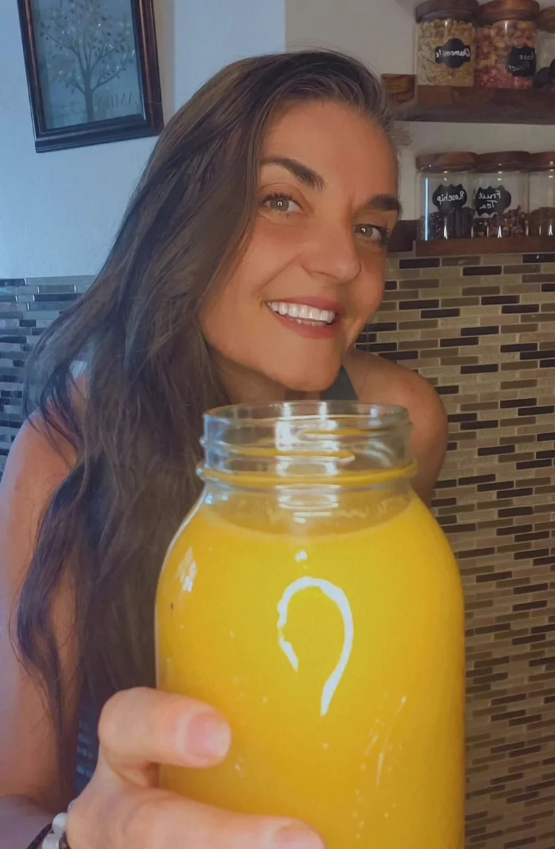 Stasha with her healthy and refreshing fruit drink certified yoga instructor